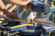 © eyecon - Roof construction building. Work on circular saw. Sawing wooden elements.