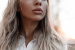 © alones - Natural beautiful female lips outdoor.  Close-up. Woman in autumn day