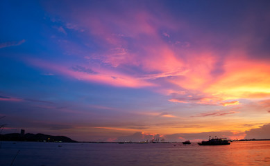 Wall Mural - Sunset over the sea with colorful sky backgroud