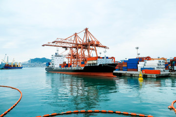 container ship at loading port : Logistics and transportation of International Container Cargo ship ,Freight Transportation, Shipping.