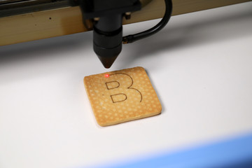 Industrial laser engraving letter B