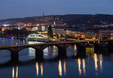 Fototapeta Paryż - view from the top of the dancing house down to the bridge over the Vltava in Prague at night - Czech Republic