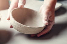 Making Pottery, Female Hands Holding Clay Bowl