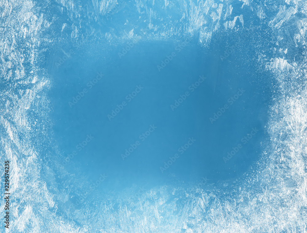 Frost patterns on frozen window as a symbol of Christmas wonder. - obrazy, fototapety, plakaty 