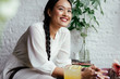 © LUMINA IMAGES - Portrait of beautiful smiling Asian woman with long bride.
