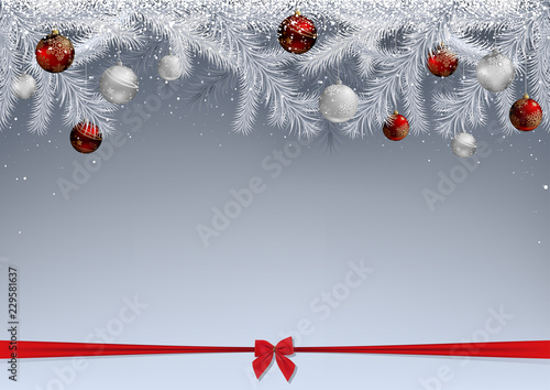 White Fir Branches Covered with Snow and Decorated with Baubles - Christmas B...