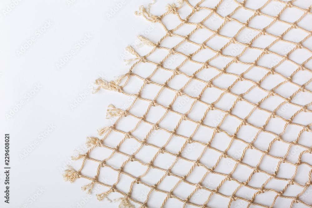 Fishnet on white background. Fishing net. Texture fishnet, seine. Dragnet, drag, trammel, sweep-net - obrazy, fototapety, plakaty 