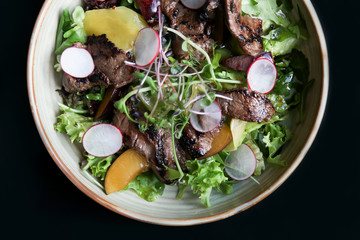 Wall Mural - Beef salad with radish, peach and green vegetables