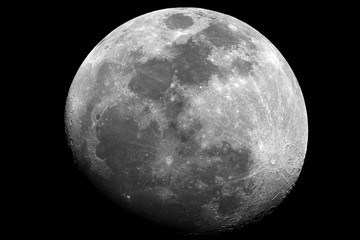 Waxing gibbous Moon phase, in a big Brightless close up, at 1500 mm of focal length, taken with reflector telescope, in black background.