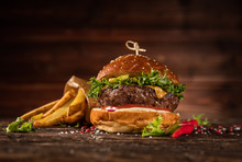 Delicious Hamburger With Fries, Served On Wood