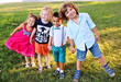 © Evgeniy Kalinovskiy - group of preschool children playing in the Park on the grass