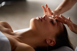 Fototapeta Konie - Head and face massage in spa salon
