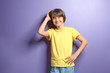 © Pixel-Shot - Smiling little boy in t-shirt on color background