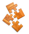 © Pixel-Shot - Pieces of wooden puzzle on white background
