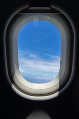 Wall Mural - flying on the plane seeing beautiful abstract white cloud and shades of bright blue sky background w