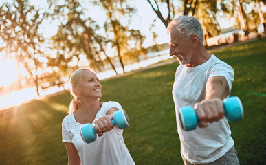 Wall Mural - Senior couple doing sport outdoors