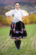 © muro - Young beautiful slovak woman in traditional costume