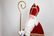 Saint Nicholas is looking at the left direction