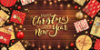 Merry Christmas and happy new year banner with Christmas decoration: colorful balls, red and gold gift box, garlands on wooden background. Xmas holiday greeting card, beautiful Christmas sale poster