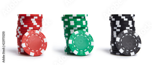 Fotomural A stacks of casino chips isolated on white background