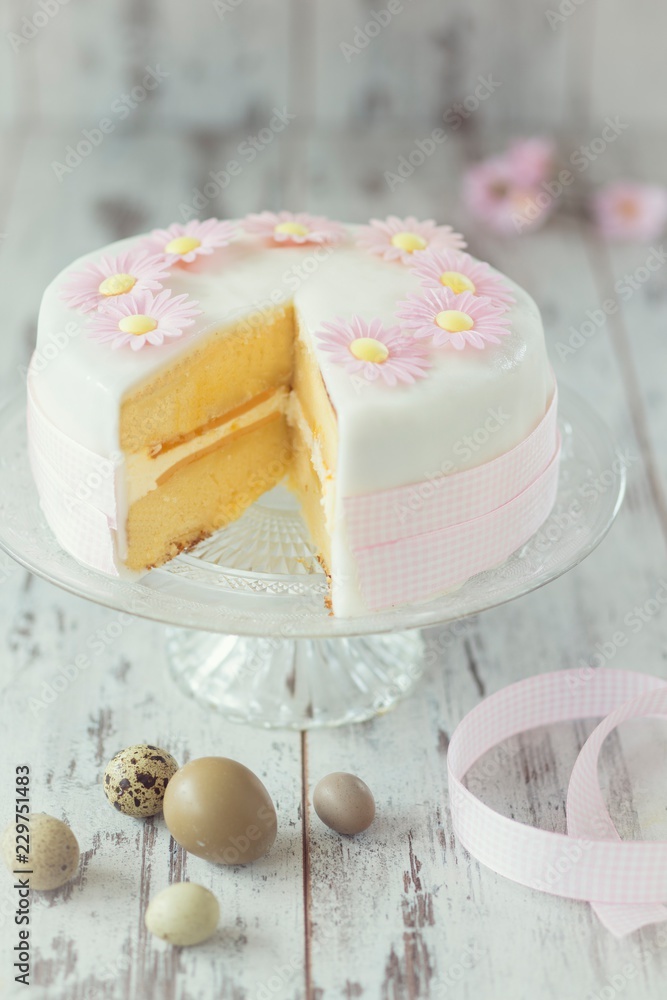 Easter cake with pink fondant flowers Stock Photo | Adobe Stock