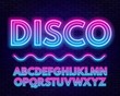 © TanyaFox - Pink blue gradient neon alphabet on a dark background . Capital letter.