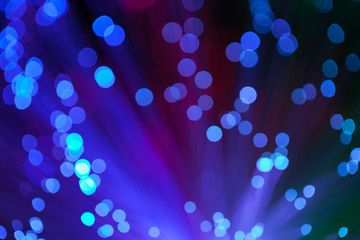 Wall Mural - Abstract background a Optical fiber lamp. Closeup of colorful optical fibers