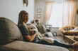 Girl with her dog at home