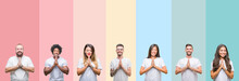Collage Of Different Ethnics Young People Wearing White T-shirt Over Colorful Isolated Background Praying With Hands Together Asking For Forgiveness Smiling Confident.