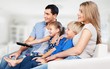 © BillionPhotos.com - Beautiful smiling Lovely family watching tv on