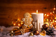 © Floydine - Christmas Background  -  Decorated candle light, gingerbread man and spices