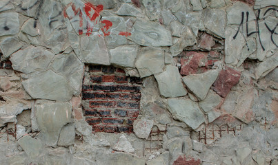 Wall Mural - Texture of damaged stone wall