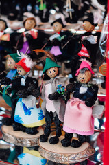 Wall Mural - Nuremberg, Bavaria / Germany - 18 11 2009: Market stall selling traditional incense smoker wooden figures and prune men, festive handmade dolls made of plums, at the Nuremberg Christmas market