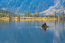 Lee Vining, CA. USA. October, 25, 2018. Fly Fisherman Fishing For Trout On Silver Lake During Fall, An Eastern Sierra Lake