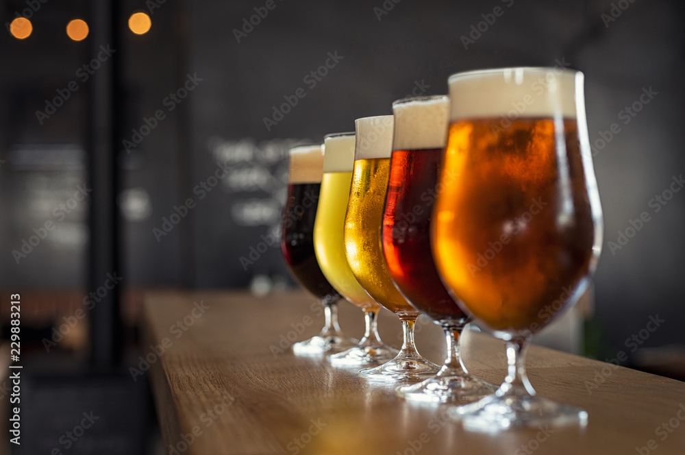 Draught beer in glasses - obrazy, fototapety, plakaty 