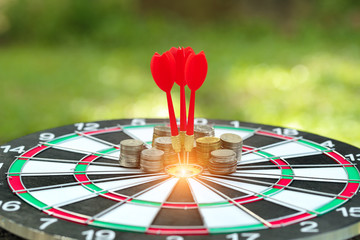 dartboard target center with arrows, idea of financial and business goal, using as background