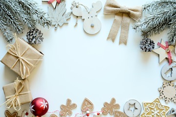 Wall Mural - christmas wooden ornament natural decoration card with copy space in center horizontal snow white