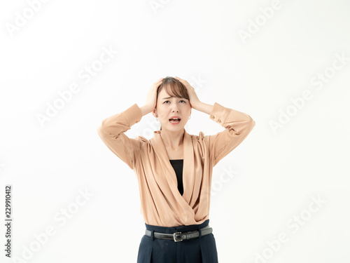 頭を抱える女性 Stock 写真 Adobe Stock 頭を抱える女性 Stock 写真 Adobe Stock