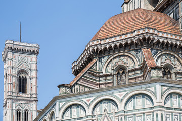 Wall Mural - Detail from the duomo in Florence, with Giotto's bell tower in the background