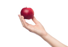 Woman's Hand Holding Red Apple, Isolated On White