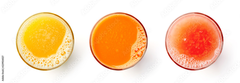 Fresh orange carrot and grapefruit juices isolated on white, from above - obrazy, fototapety, plakaty 