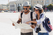 Loving Couple Planning Walk Route With Map