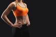 © Prostock-studio - Athletic woman showing muscular body