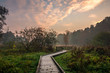 Sunrise over the footbridge in park in Konstancin Jeziorna, Mazowieckie, Poland