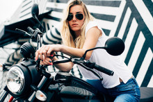 Young Woman On Motorcycle