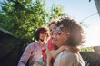 © Stocksy - Smiling family enjoying outdoors