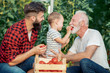 © ivanko80 - Three generations work in greenhause