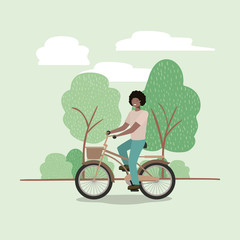 Wall Mural - young man in bicycle on park