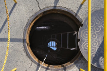 Open Manhole On A City Street