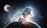 Fototapeta Kosmos - Spaceman steal planet. Mixed media
